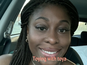Toying_with_toya